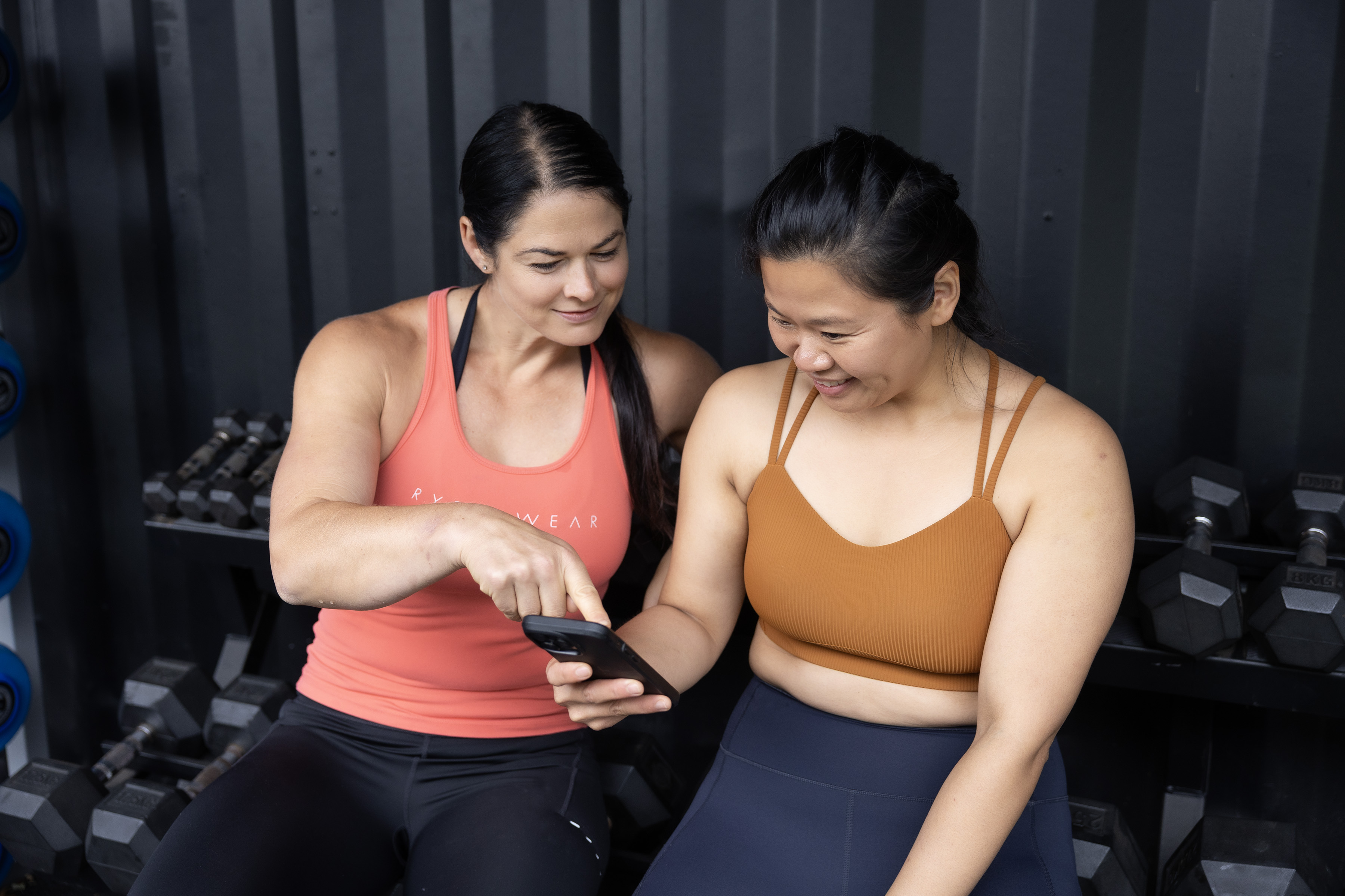 Member using The Forever Fit Method app at the gym